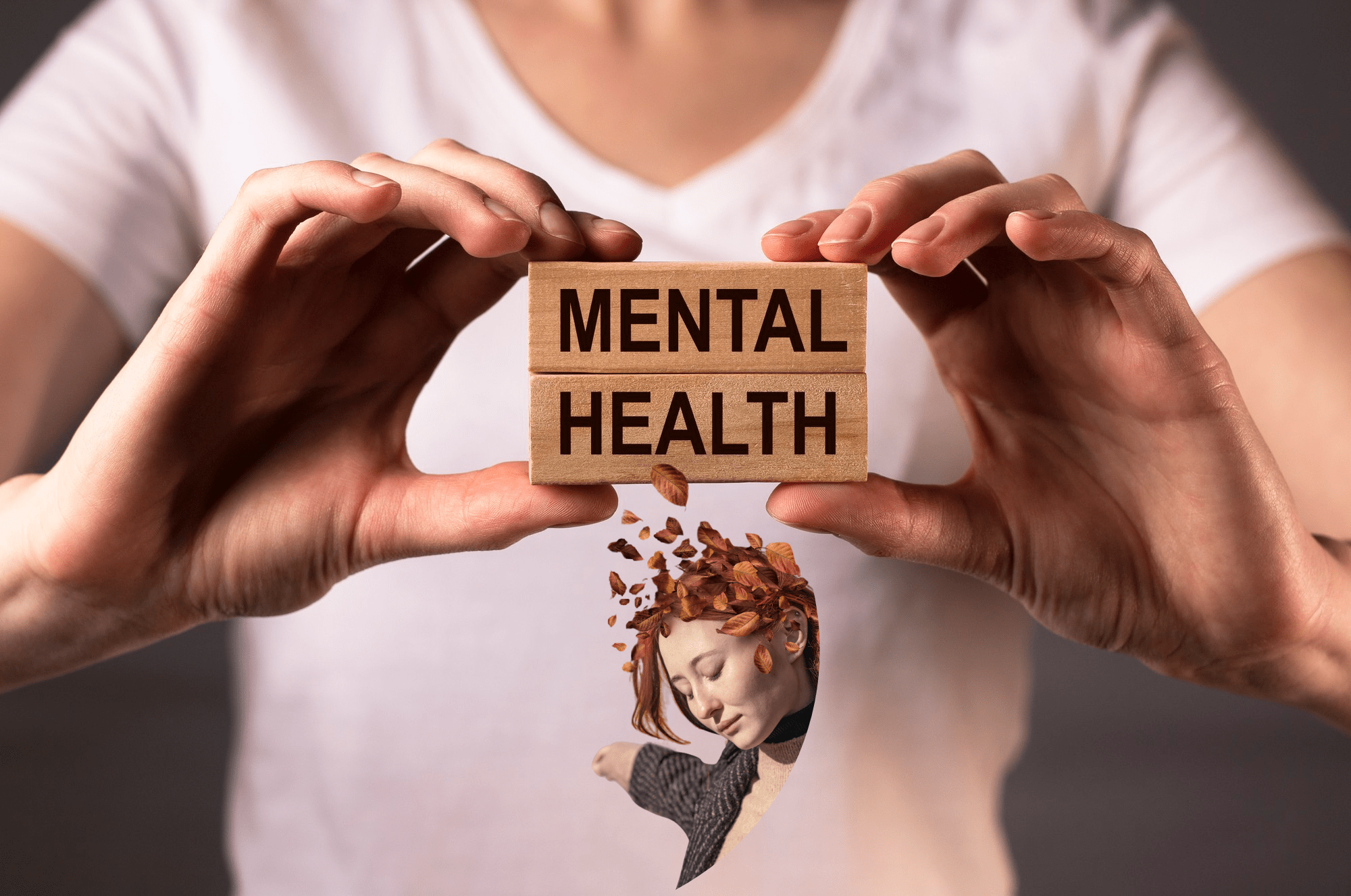 the word mental health with a woman's hands holding it, in the style of rusty debris, realistic, emotive portraits, light beige and amber, consumer culture critique, caffenol developing, realistic attention to detail, anime-inspired